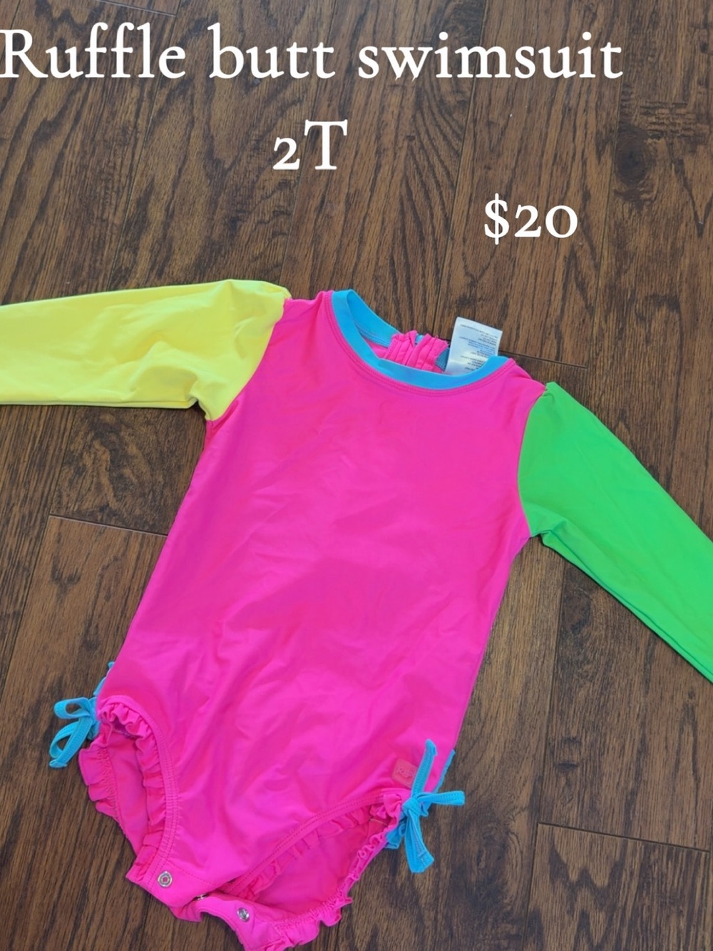Ruffle Butts Toddler Girl Pink Swimsuit with Yellow & Green Sleeves